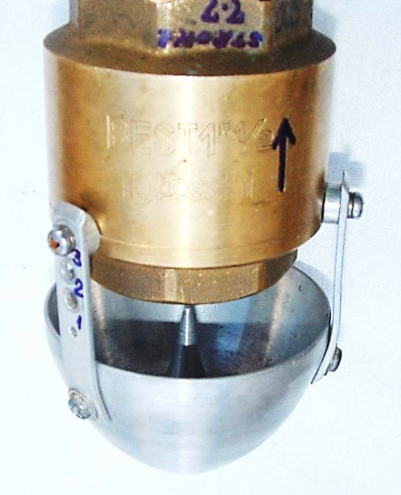 Figure 4 : Test arrangement for the 1.5" spring-loaded poppet valve with and without a parabolic deflector with a model sonic (resonance) pump. The power supply equipment is shown in figure 5, where the control charger, DC-AC inverter, AC outlet, power meter and the battery pack are noted.