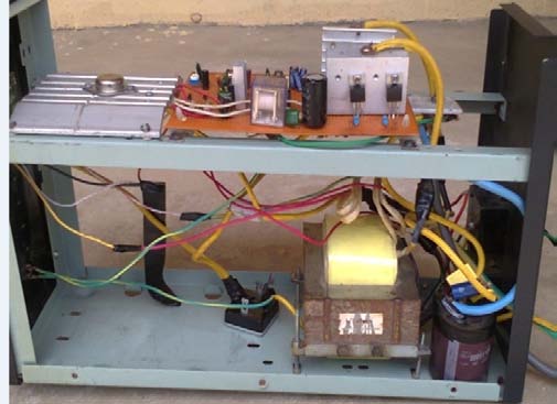 Figure 4 : Constructed Inverter and Charge controller Connecting an external capacitor C 4 and resistor R 3 to pins 5 and 6 control the oscillation frequency of the TL494.Choosing C 4 to be 100nF and using eqn 14, R 3 is obtained as 100???(Alberkrack, 2002).
