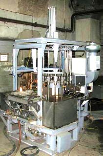 Figure 9: Loading of Contaminated Parts for Cleaning and Unloading the Cleaned Parts.