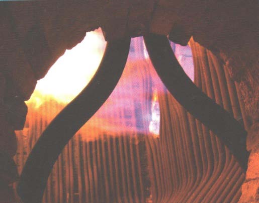 Fig. 3: Interior view of the furnace of the steam boiler, burner, torch