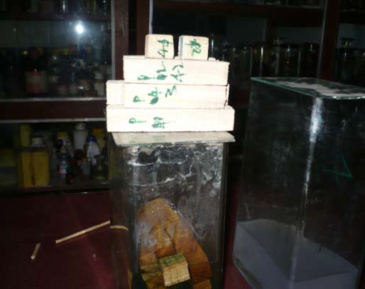 Fig. 4 : a) steel balls b) steel ball forging dies c) trimming dies; photo from Akaki Basic Metals Industry