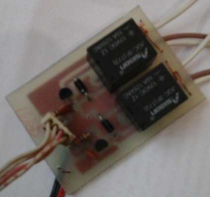 Figure 12 : The Panel Board Breaker and the InterfaceThe connection of circuit breaker with the interface device, computer and from the main source was shown in figure13. The main source was directly connected to the contactor of the relay. The relay driver was connected to the microcontroller module output.